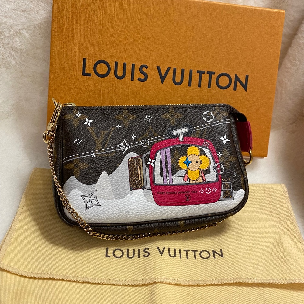 Authentic Louis Vuitton Christmas edition mini Pochette accessories Cable Cart